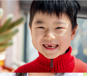 5 year old smiling with missing teeth