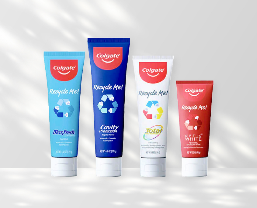 Young woman is brushing her teeth